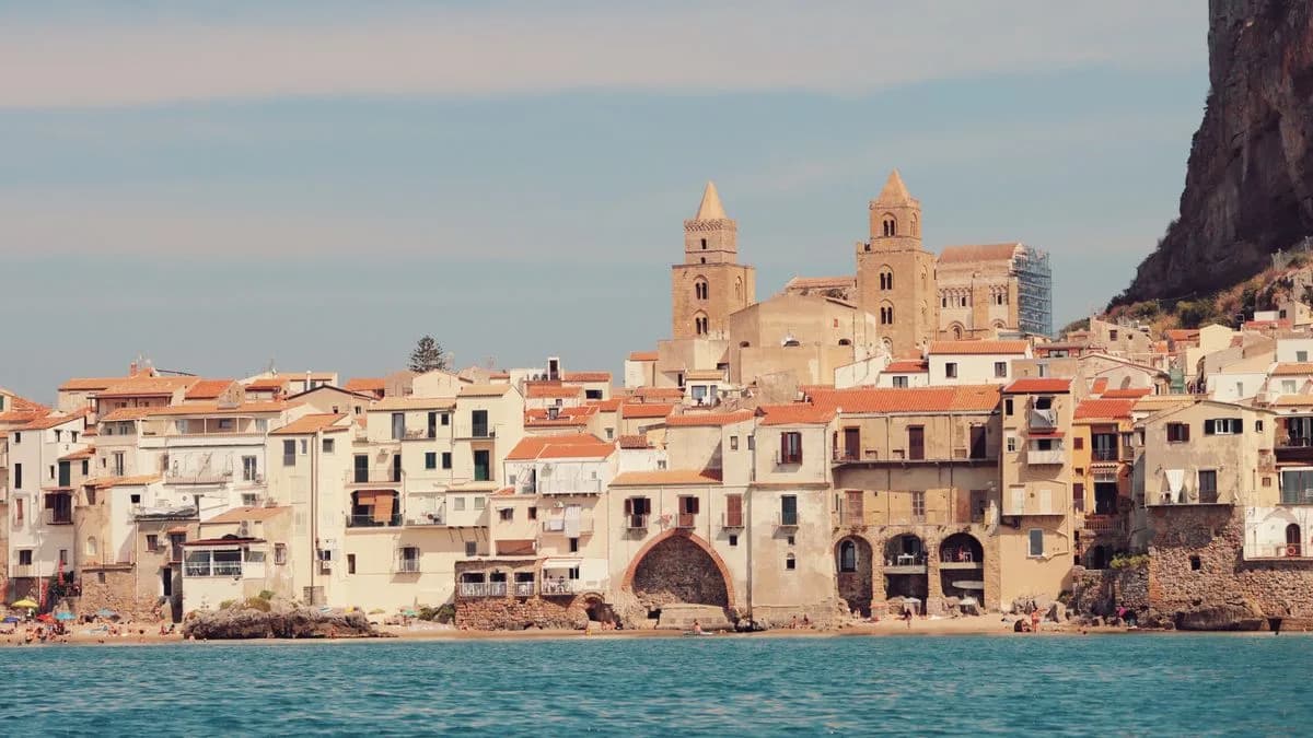 Transferhood — Palermo: Your Gateway to Western Sicily (the seaside old town of Cefalù beneath its rock)